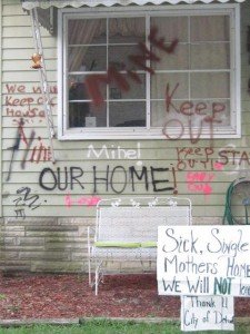 The graffiti Kelly Parker sprayed on her house to deter bidding during Wayne County's tax auction.